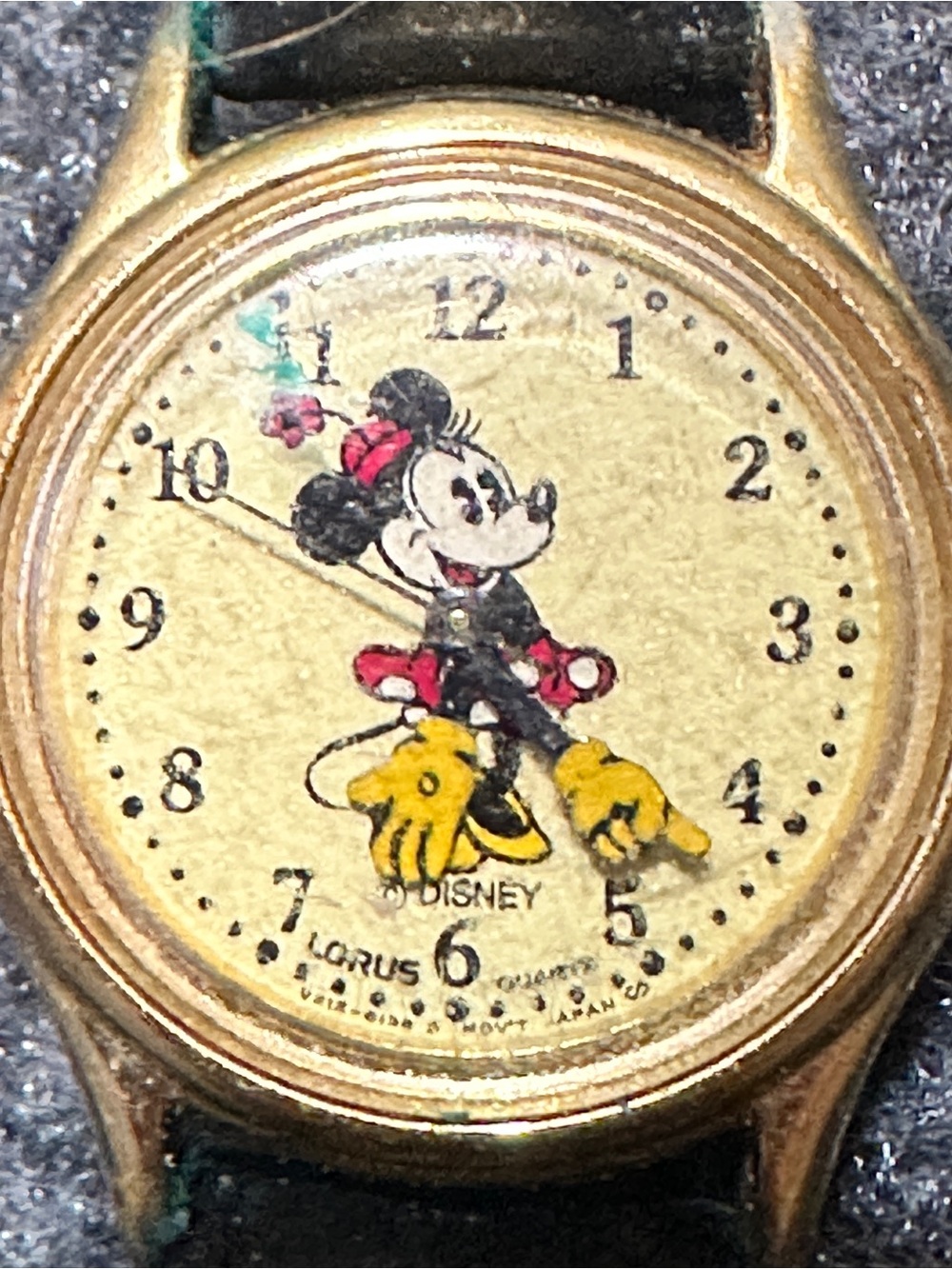 Vintage gold-tone Lorus Disney Minnie Mouse quartz wristwatch with a character